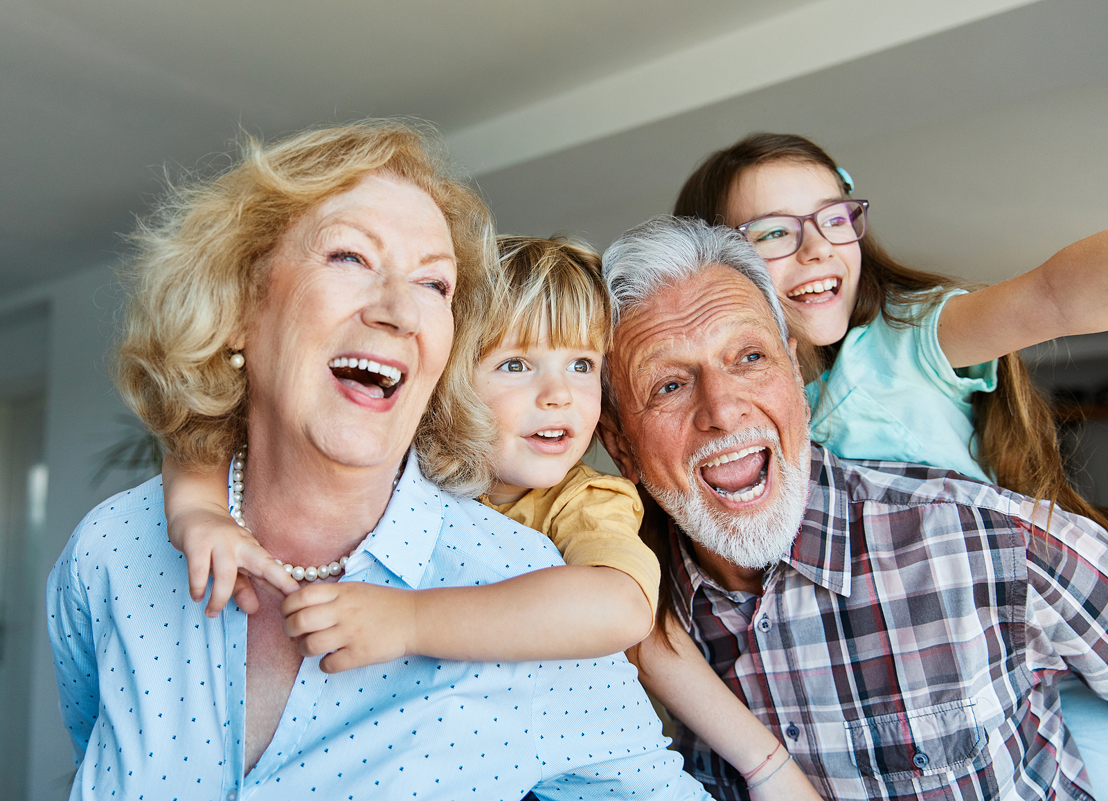 https://www.sumahomecare.com/wp-content/uploads/2023/11/bigstock-Portrait-Of-Grandparents-And-G-468708565.jpg